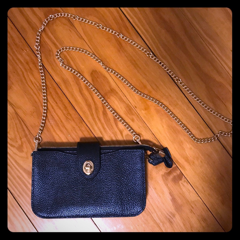 Metallic navy color Coach crossbody/clutch.